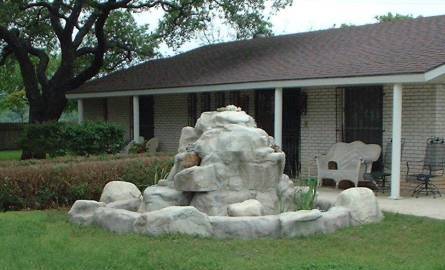 Circular waterfall and pond - San Antonio, Texas.